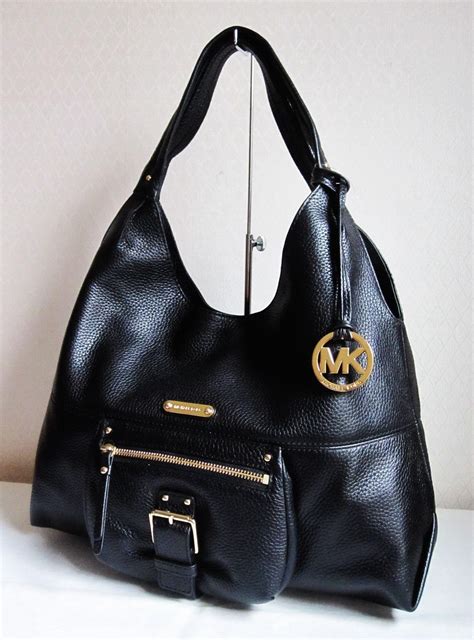 what are michael kors purses made of|ebay michael kors handbags used.